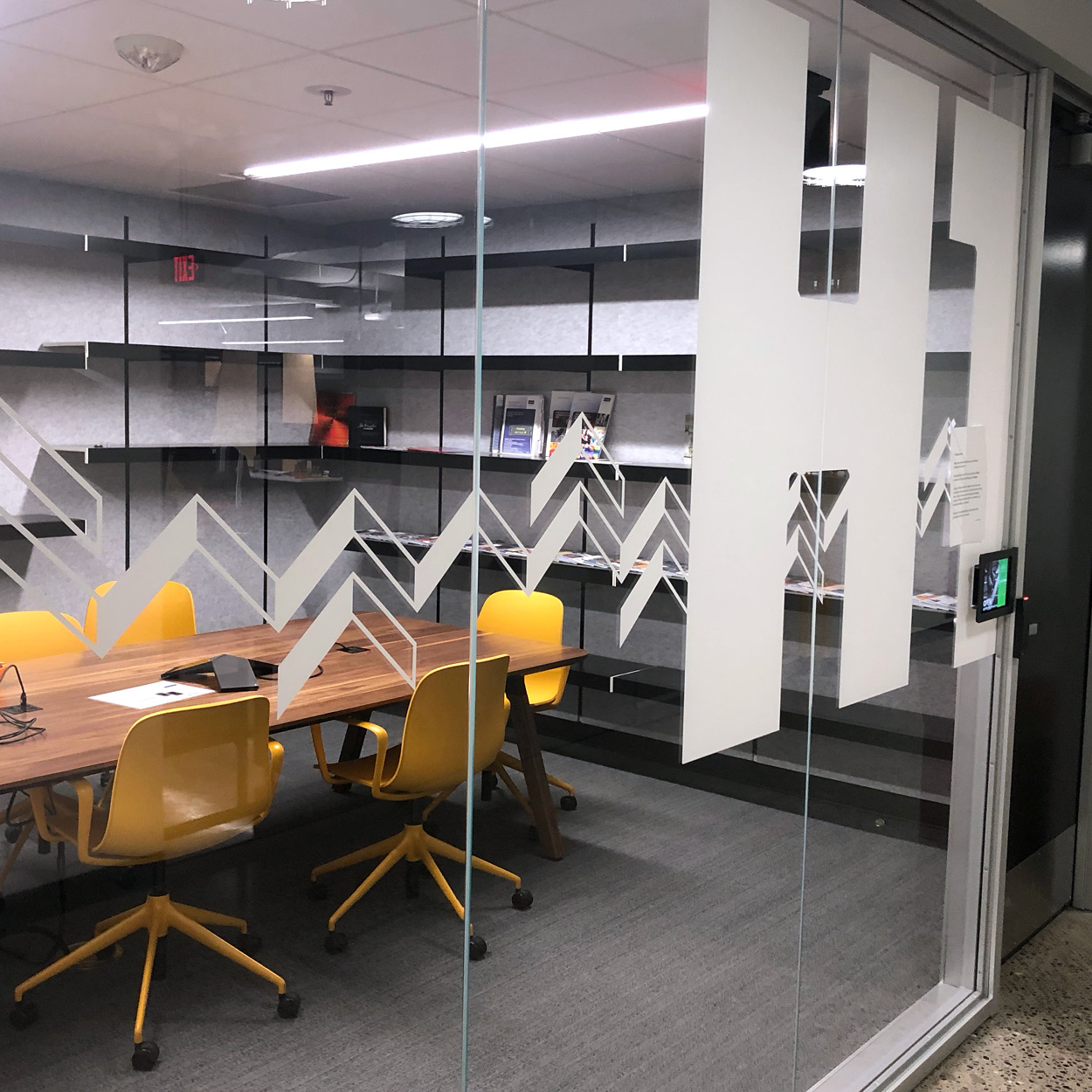 Conference room window with H1 and triangle pattern